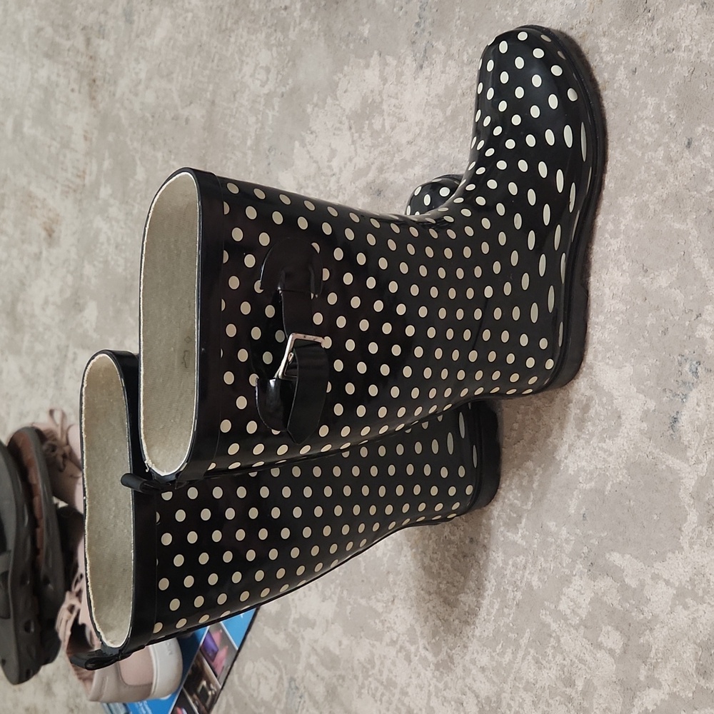 black and white tall rain boots